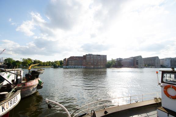 A photo of the dots office building on the river Spree